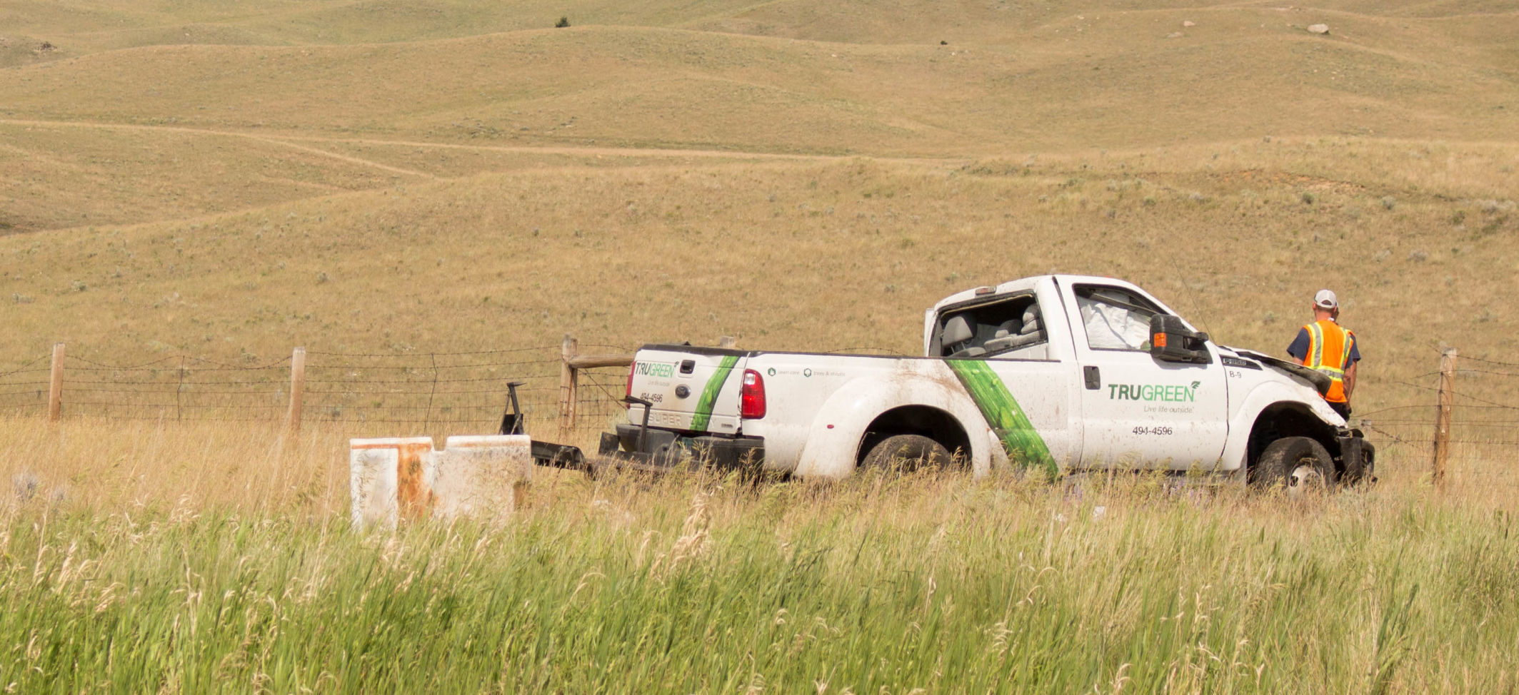 Tru Green truck crashes on Interstate 15